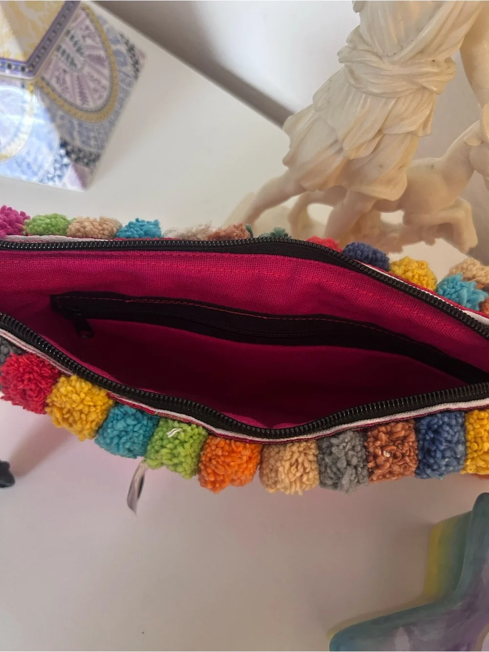 Colorful Embroidered wristlet with Pom Poms